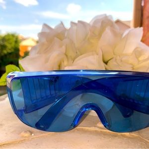 Transparent thick sunglasses.